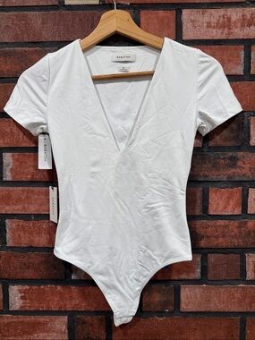 Babaton White Deep V Short Sleeve Bodysuit
